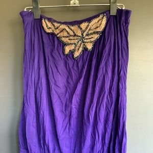 Purple top with decorative accent/embellishment